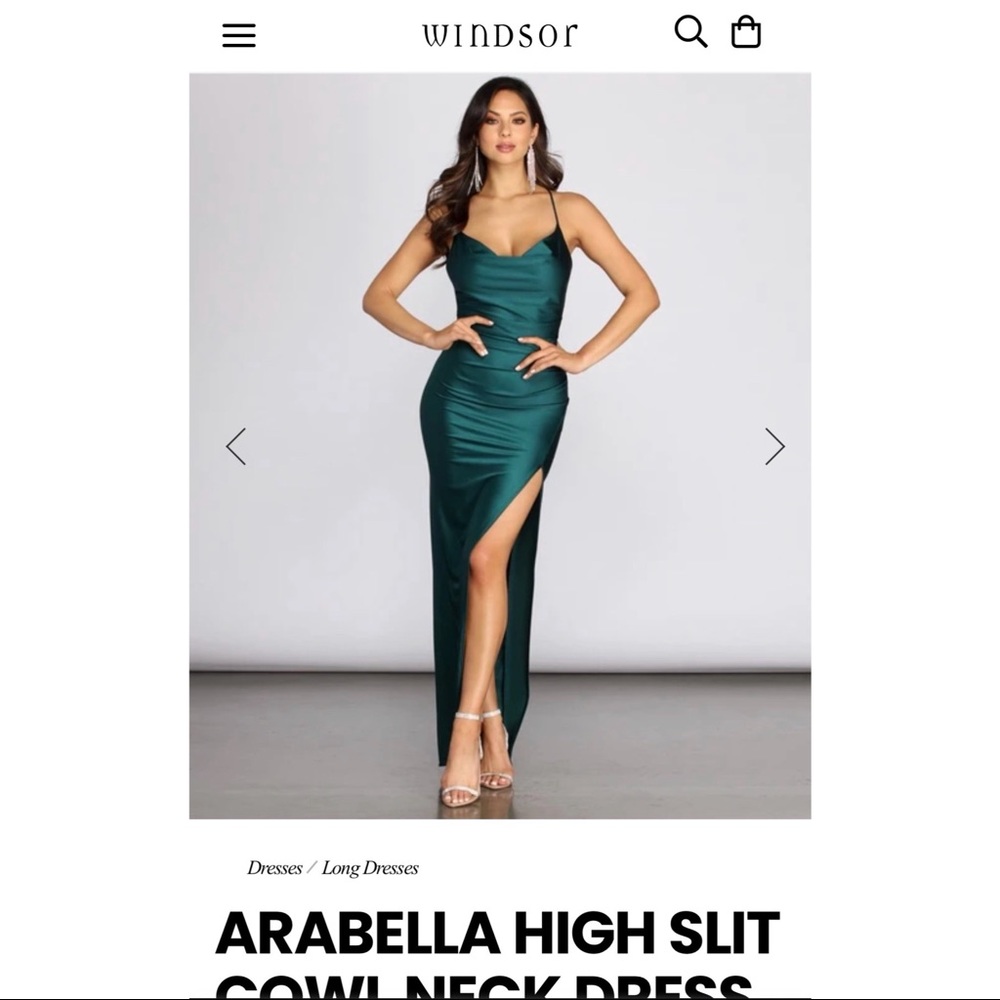 NEVER WORN. Beautiful teal/green formal dress with a leg slit. —Windsor